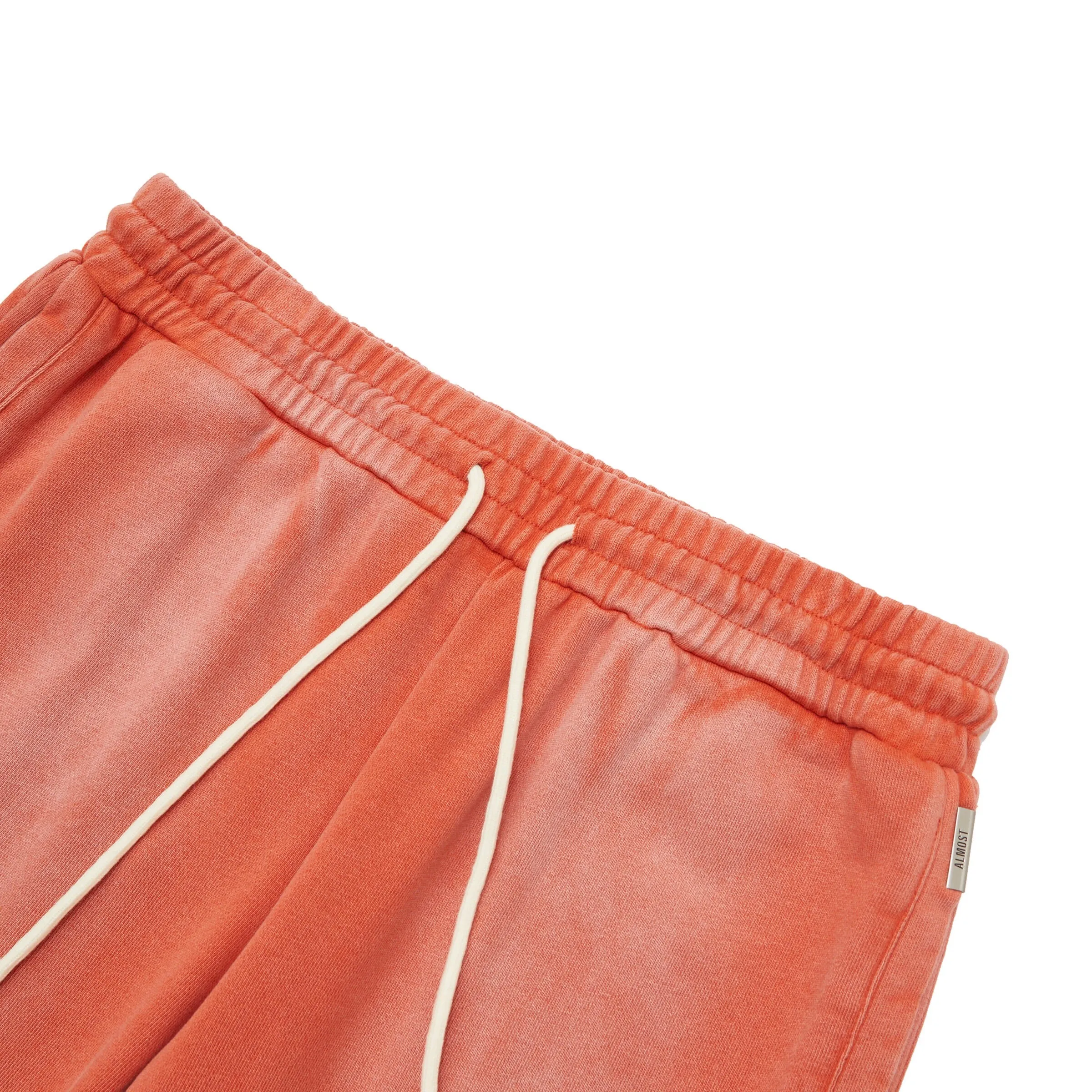 Signature Sun fade Stacked Joggers Orange